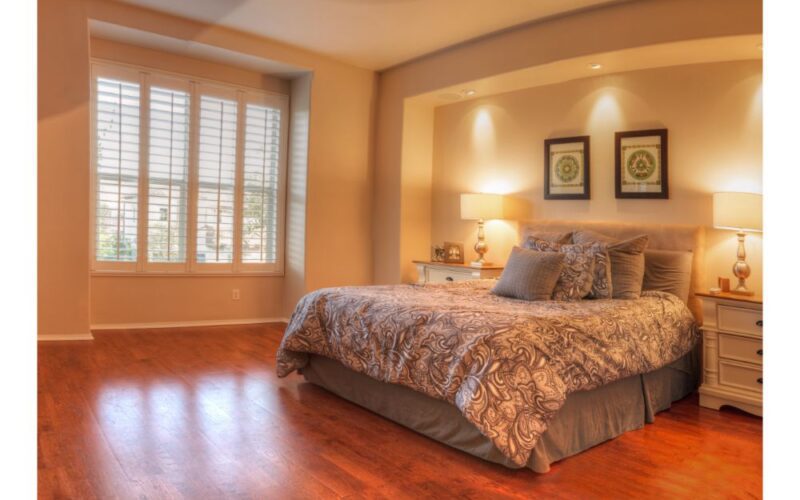 master bedroom with recessed lighting